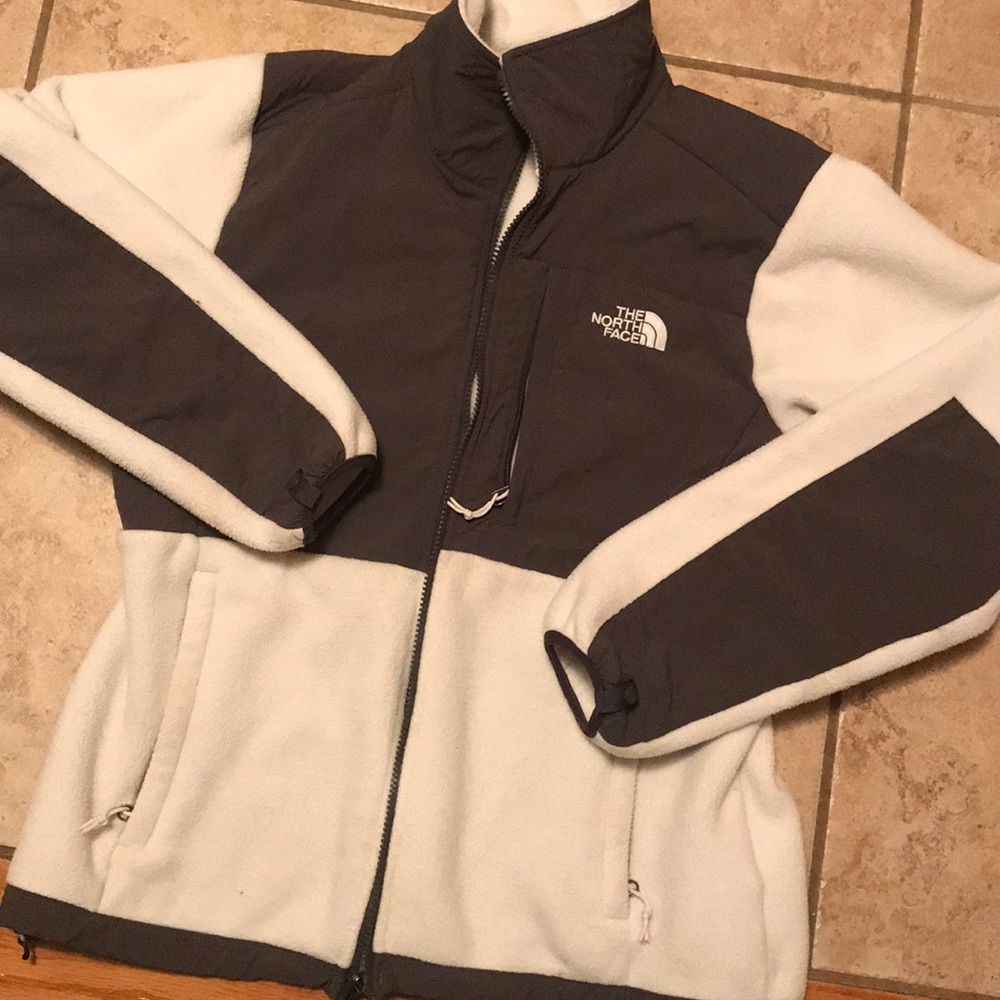 White and grey north face Denali